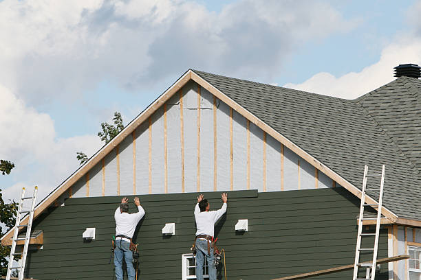 Professional Siding Replacement technician working in Naples, TX